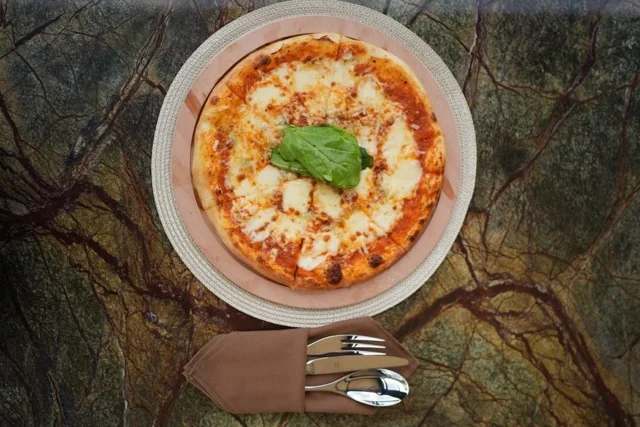Pizza with 4 cheese at Fiaba Brasserie