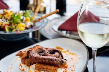 Food served on a set table at Fiaba Brasserie