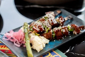 Food and dessert on a table at Fiaba Brasserie