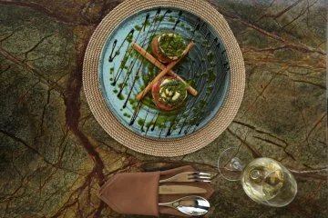 A plated meal on a set table at Fiaba Brasserie