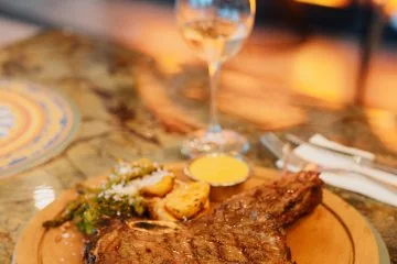 A plated main course in the dining room at Fiaba Brasserie