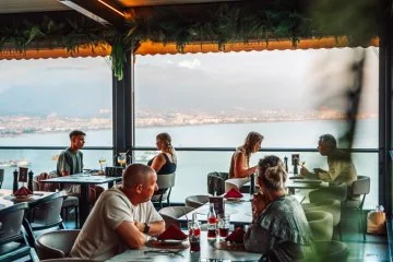 The window-side dining space at Fiaba Brasserie in Alanya